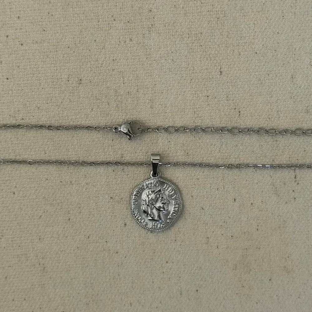 Y2k 2000s silver coin pendant